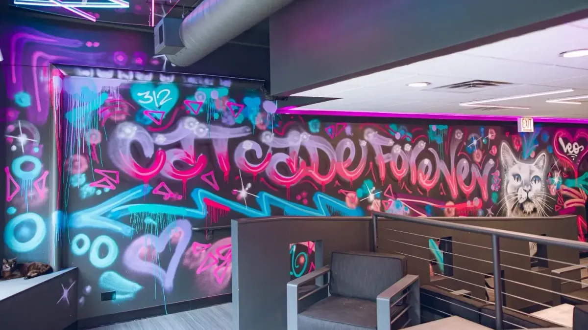 The Catcade's neon graffiti lounge in Lakeview